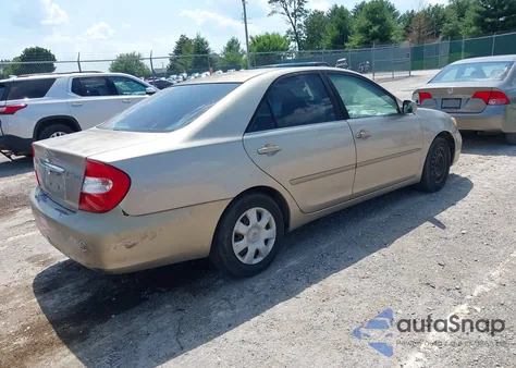 2002 Toyota Camry Le z USA, uszkodzony, nr VIN 4T1BE32K12U577914